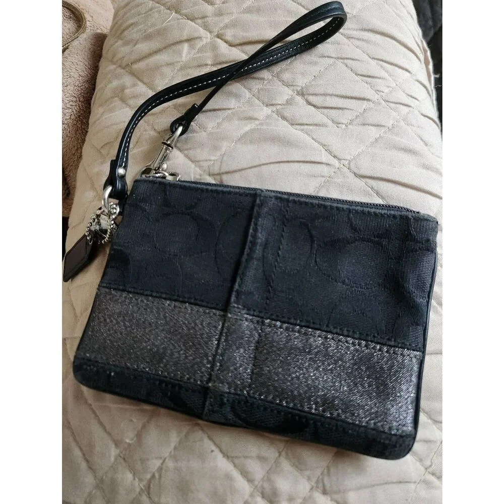 Coach black Signature Jacquard small Zip Wristlet with 65th anniversary lining
